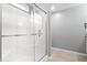 Modern bathroom showcasing glass-door shower at 4704 Blue Marlin Way, Indianapolis, IN 46239