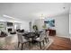 Open-concept dining area seamlessly flows into the living room, perfect for entertaining at 4704 Blue Marlin Way, Indianapolis, IN 46239