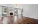 Spacious living room featuring a fireplace, hardwood floors, and plenty of natural light at 4704 Blue Marlin Way, Indianapolis, IN 46239
