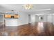 Spacious living room with an open floor plan and view of kitchen at 4704 Blue Marlin Way, Indianapolis, IN 46239