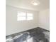 Bright bedroom with a sleek floor and a view at 5034 Allisonville Rd # A, Indianapolis, IN 46205