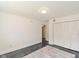 Clean bedroom with large closet, overhead light, and a doorway to another room at 5034 Allisonville Rd # A, Indianapolis, IN 46205