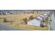 An aerial view features a house with a landscaped backyard near a community park, showcasing its desirable location at 5524 Goodwin St, Indianapolis, IN 46234