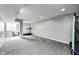 Spacious finished basement offering a treadmill, trampoline, and weight rack at 5524 Goodwin St, Indianapolis, IN 46234