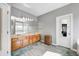 Large bathroom with double sinks, modern vanity lighting, and separate toilet room at 5524 Goodwin St, Indianapolis, IN 46234