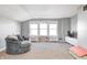 Bright bonus room featuring a cozy chair, a TV, ample natural light, and personalized decor at 5524 Goodwin St, Indianapolis, IN 46234