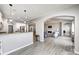 Open concept living space with view of kitchen and living room with fireplace at 5524 Goodwin St, Indianapolis, IN 46234