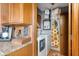 Convenient laundry area with washer, dryer, and storage, located just off the kitchen at 5529 W 29Th Pl, Indianapolis, IN 46224