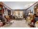 Spacious living room with plush carpeting, comfortable seating, and an abundance of natural light, perfect for relaxation at 5529 W 29Th Pl, Indianapolis, IN 46224
