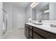 Bathroom with double sink vanity, white countertops and a glass enclosed shower at 568 Harstad Blvd, Westfield, IN 46074