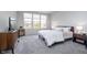 Comfortable bedroom features soft carpeting, large windows, and stylish furniture at 568 Harstad Blvd, Westfield, IN 46074
