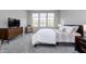 Relaxing bedroom with large windows, neutral tones, and modern furnishings at 568 Harstad Blvd, Westfield, IN 46074