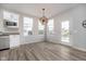 Bright dining area with modern light fixtures, and easy access to the patio at 568 Harstad Blvd, Westfield, IN 46074