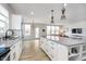 Modern kitchen with granite countertops, stainless steel appliances, and open to living area at 568 Harstad Blvd, Westfield, IN 46074