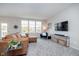 Relaxing living space with a large window, comfortable seating, and modern entertainment setup at 568 Harstad Blvd, Westfield, IN 46074