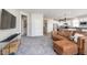 Open floor plan showcasing the living area leading to the kitchen with modern cabinets and appliances at 568 Harstad Blvd, Westfield, IN 46074