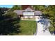 Stunning aerial view of the property, highlighting the lush greenery and landscape at 5704 Springhollow Ct, Avon, IN 46123