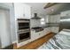 Gourmet kitchen features stainless steel appliances and stylish granite countertops at 5704 Springhollow Ct, Avon, IN 46123