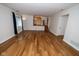 Bright living room with hardwood floors and staircase view at 5704 Springhollow Ct, Avon, IN 46123