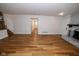 Living room features a fireplace, and hardwood floors at 5704 Springhollow Ct, Avon, IN 46123