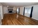 Open living room area with fireplace and hardwood floors at 5704 Springhollow Ct, Avon, IN 46123