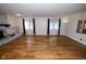 Spacious living room featuring hardwood floors and a stone fireplace at 5704 Springhollow Ct, Avon, IN 46123