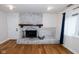 Charming living room area with fireplace and hardwood floors at 5704 Springhollow Ct, Avon, IN 46123