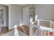 Calming Bedroom features a crib, large windows, hardwood floors, and a soft, white rug at 6009 N Washington Blvd, Indianapolis, IN 46220