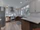 Remodeled kitchen with stainless appliances and granite counters at 6009 N Washington Blvd, Indianapolis, IN 46220