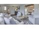 Bright living room boasts hardwood floors, comfortable seating, and elegant decor, creating a welcoming space at 6009 N Washington Blvd, Indianapolis, IN 46220