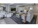 Comfortable living room featuring a sectional sofa, stylish furnishings, neutral color palette, and seamless living at 6009 N Washington Blvd, Indianapolis, IN 46220