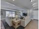 Bright living room boasts ample natural light, comfortable seating, and a seamless living at 6009 N Washington Blvd, Indianapolis, IN 46220