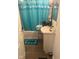 Small bathroom complete with bathtub, sink and accessories at 620 W Madison St, Alexandria, IN 46001
