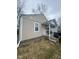 View of a cozy home featuring vinyl siding and a covered front porch at 620 W Madison St, Alexandria, IN 46001