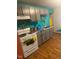 Functional kitchen area with essential appliances and plenty of counter space at 620 W Madison St, Alexandria, IN 46001