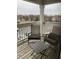 Cozy balcony with outdoor seating, perfect for relaxing and enjoying the view at 6526 Jade Stream Ct # 309, Indianapolis, IN 46237