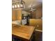 This kitchen features granite countertops, updated appliances, and stylish globe lighting at 6526 Jade Stream Ct # 309, Indianapolis, IN 46237