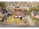 An aerial shot of a home with an attached garage, and surrounding landscaping at 6528 Hedback Dr, Indianapolis, IN 46220