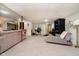 Spacious finished basement with a seating area and plenty of room for activities at 6528 Hedback Dr, Indianapolis, IN 46220