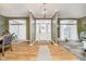 Inviting foyer with hardwood floors and natural light at 6528 Hedback Dr, Indianapolis, IN 46220