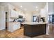 Kitchen view featuring white cabinetry, stainless appliances, and stylish countertops at 6528 Hedback Dr, Indianapolis, IN 46220