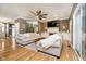Comfortable living room with hardwood floors and ample seating at 6528 Hedback Dr, Indianapolis, IN 46220