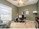 Comfortable office space with a desk, office chair, and a window for natural light at 6528 Hedback Dr, Indianapolis, IN 46220