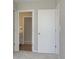 Bathroom featuring a double vanity and a linen closet at 7181 Barrett Dr, Brownsburg, IN 46112