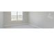 Bedroom featuring a large window and neutral colored carpet at 7181 Barrett Dr, Brownsburg, IN 46112