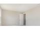 A light-filled bedroom with neutral paint and a white door at 7181 Barrett Dr, Brownsburg, IN 46112