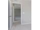Bright bedroom with neutral carpet and paint leads to additional rooms and ample lighting at 7181 Barrett Dr, Brownsburg, IN 46112