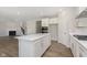 Modern kitchen with white cabinets and stainless steel range at 7181 Barrett Dr, Brownsburg, IN 46112