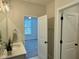 Stylish bathroom featuring granite countertop and access to bedroom at 761 Stone Trace Ct, Avon, IN 46123