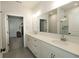 Modern bathroom featuring dual sinks, quartz countertops, and a tiled shower at 761 Stone Trace Ct, Avon, IN 46123